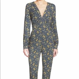 FREE PEOPLE “Midnight Combo” Sunflower Print Long Sleeve V Neck Jumpsuit sz 0